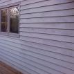 SIDING CLEANING FOR KEWADIN HOME ON GRAND TRAVERSE BAY